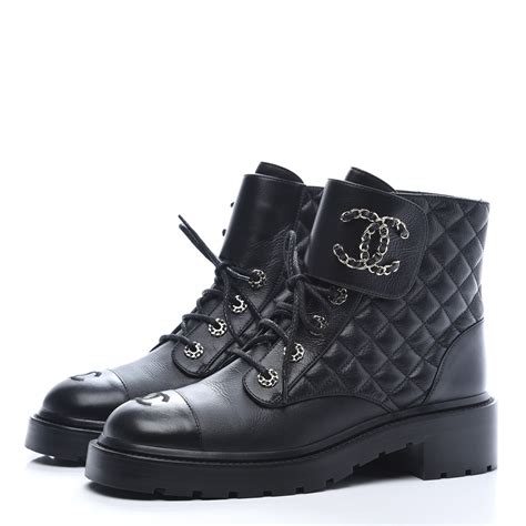 chanel black long boots|Chanel quilted combat boots.